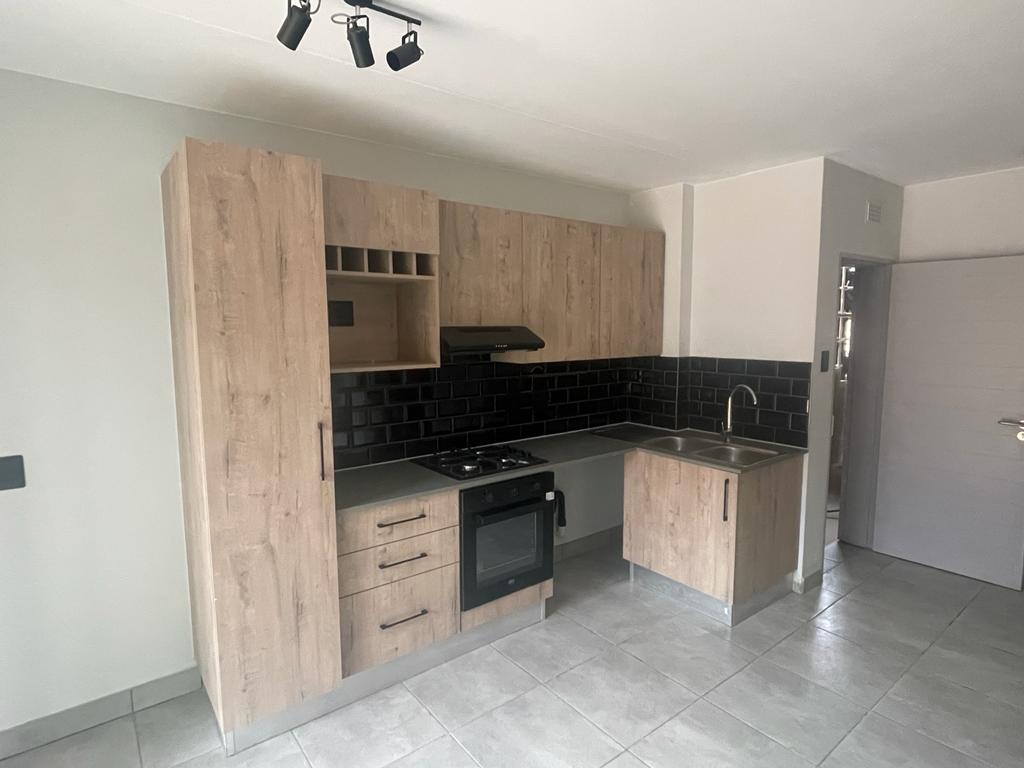 Modern kitchen finish with gas hob and electric oven